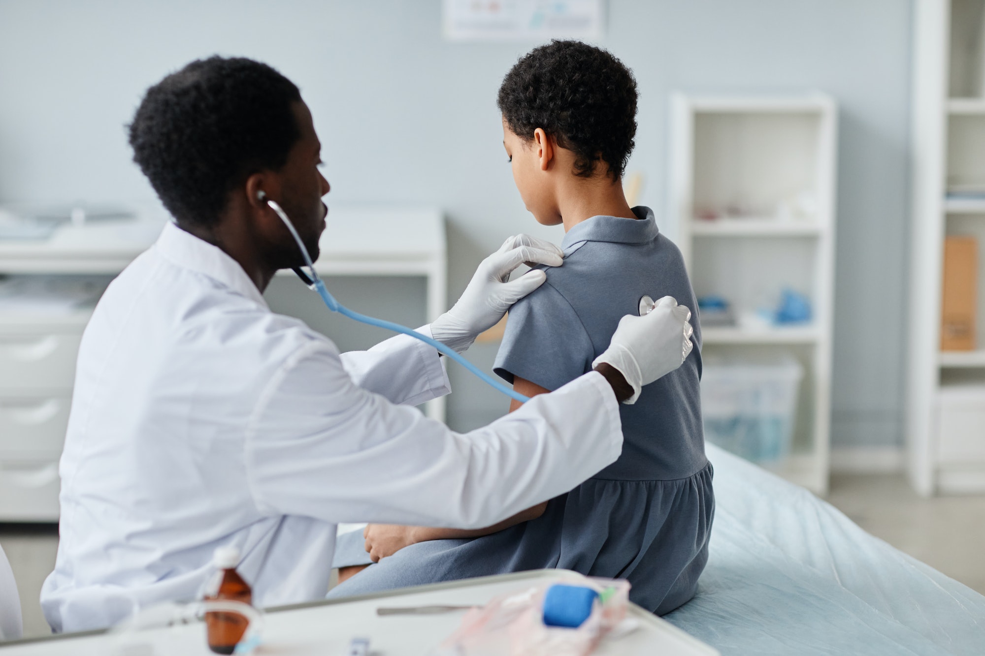 Pediatrician Examining Child